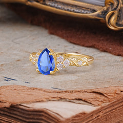 Nature-Inspired Vintage 4-Prong Pear Cut Sapphire Bridal Set