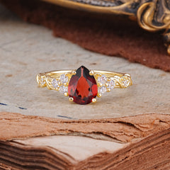 Nature-Inspired Vintage 4-Prong Pear Cut Garnet Ring