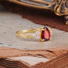 Nature-Inspired Vintage 4-Prong Pear Cut Garnet Ring