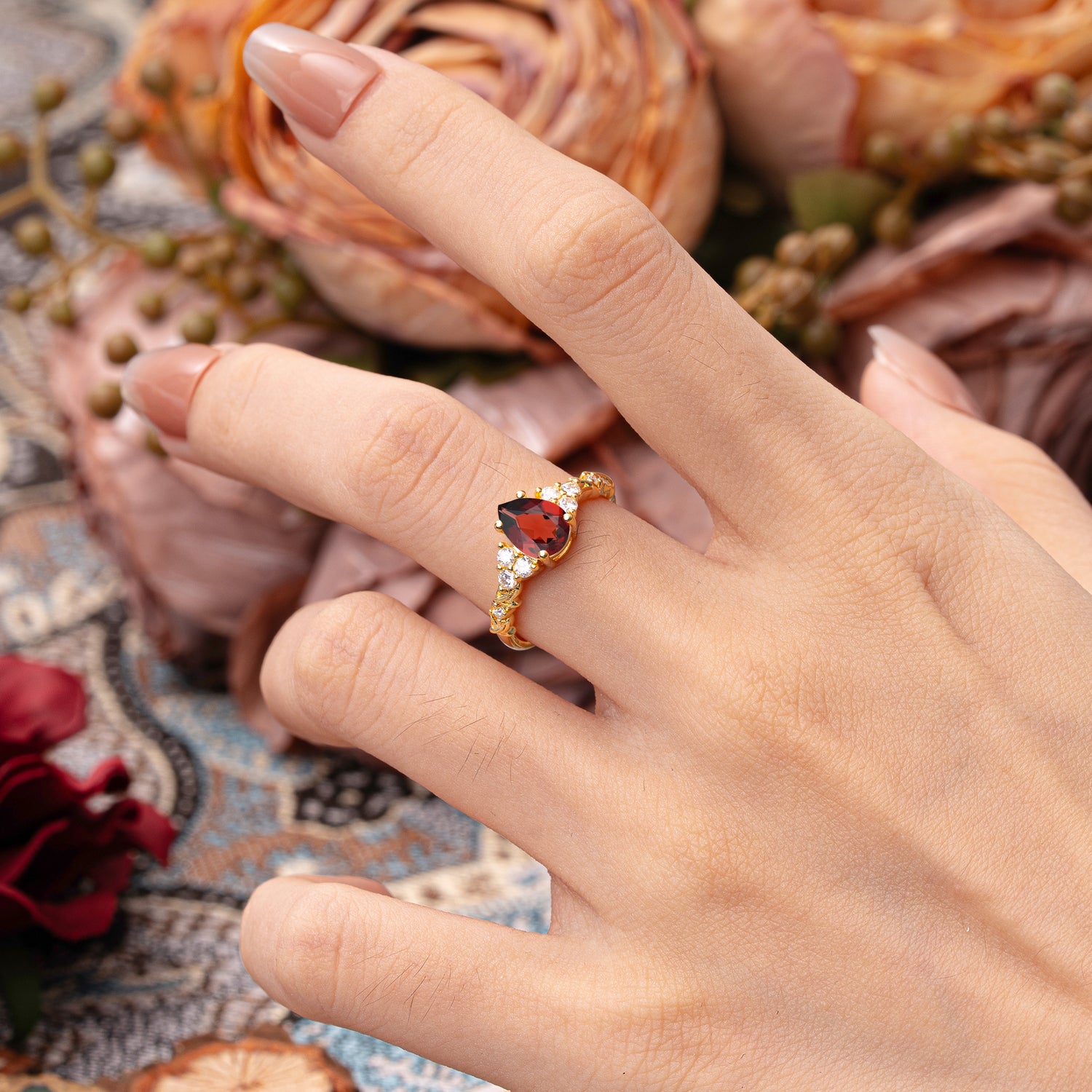Nature-Inspired Vintage 4-Prong Pear Cut Garnet Ring
