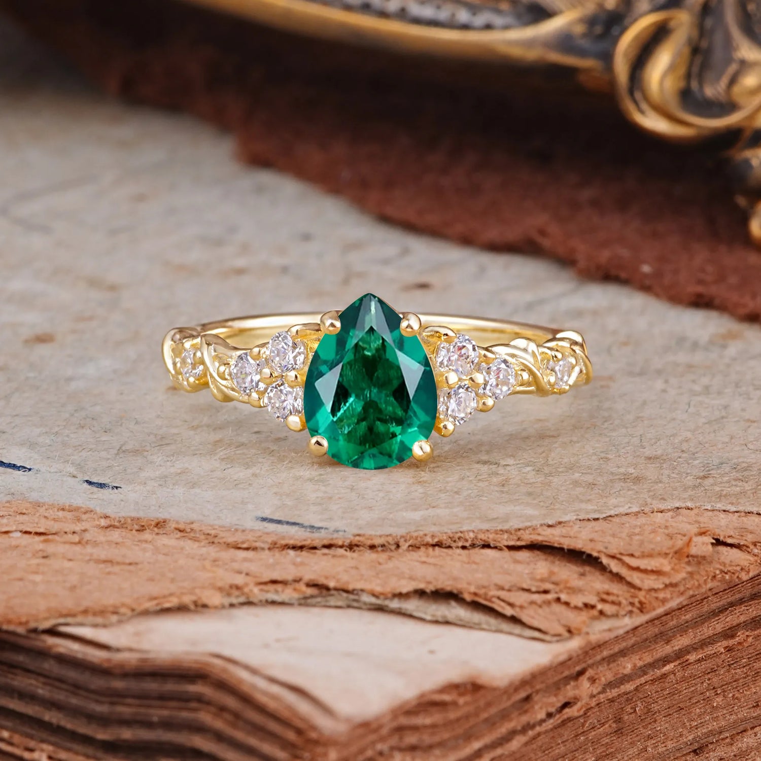Nature-Inspired Vintage 4-Prong Pear Cut Emerald Ring