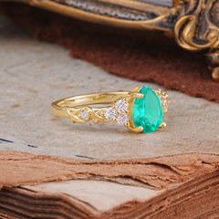 Nature-Inspired Vintage 4-Prong Pear Cut Emerald Ring