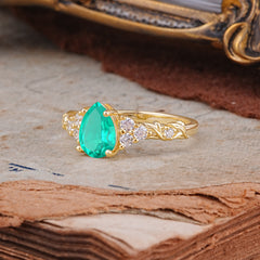 Nature-Inspired Vintage 4-Prong Pear Cut Emerald Ring