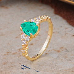 Nature-Inspired Vintage 4-Prong Pear Cut Emerald Ring