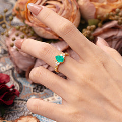 Nature-Inspired Vintage 4-Prong Pear Cut Emerald Ring