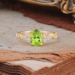 Nature-Inspired Vintage 4-Prong Pear Cut Peridot Ring