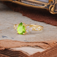 Nature-Inspired Vintage 4-Prong Pear Cut Peridot Ring