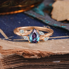 Exquisite 4-Prong Pear Cut Alexandrite Engagement Ring