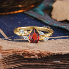 Exquisite 4-Prong Pear Cut Garnet Engagement Ring
