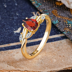 Exquisite 4-Prong Pear Cut Garnet Engagement Ring