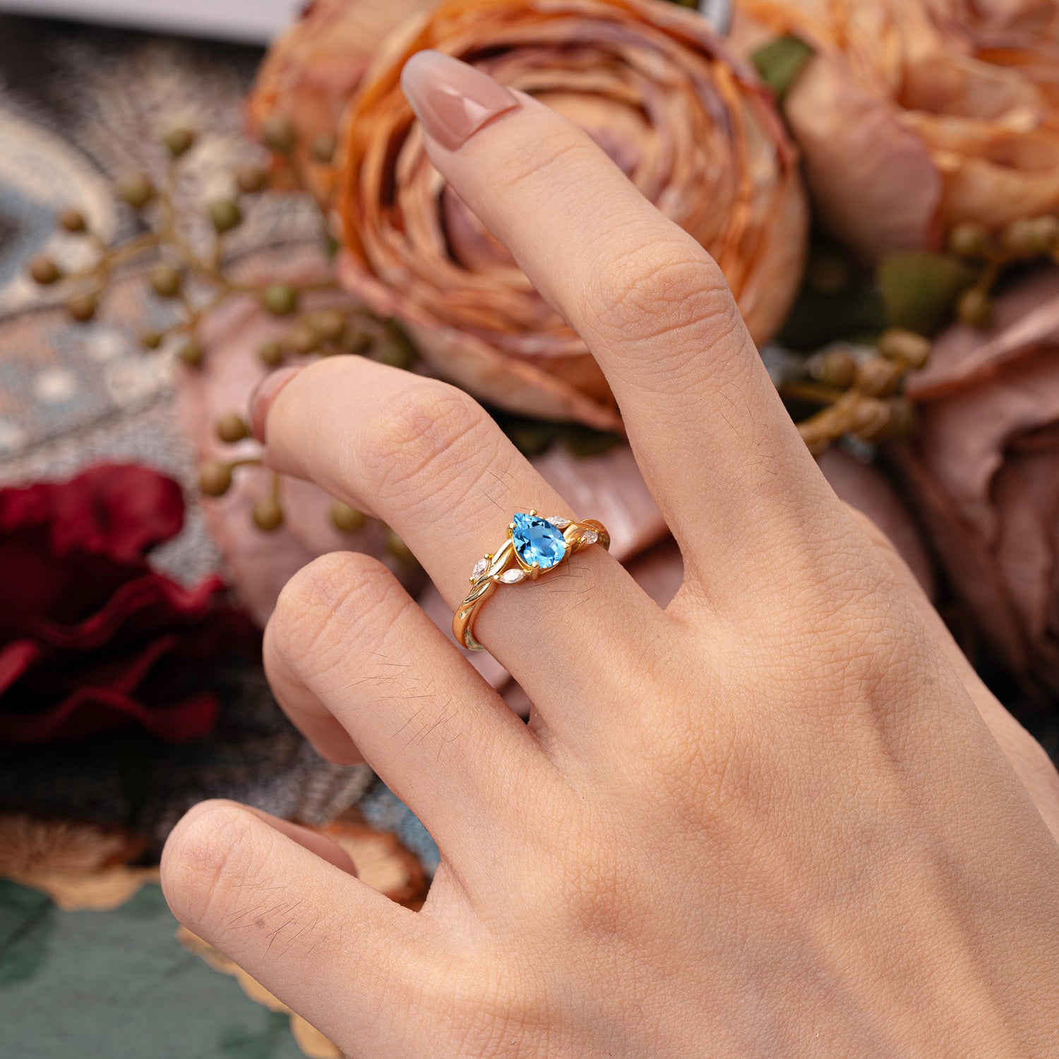 Exquisite 4-Prong Pear Cut Aquamarine Engagement Ring