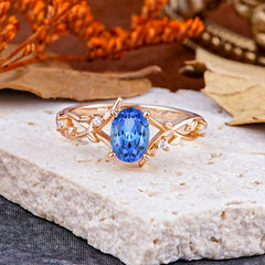 Nature-Inspired Branch-Wrapped 4-Prong Oval Sapphire Engagement Couple Rings