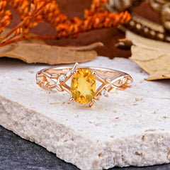 Nature-Inspired Branch-Wrapped 4-Prong Oval Citrine Engagement Rings