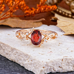 Nature-Inspired Branch-Wrapped 4-Prong Oval Garnet Engagement  Rings