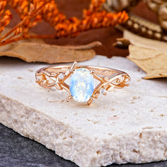 Nature-Inspired Branch-Wrapped 4-Prong Oval Moonstone Engagement  Rings
