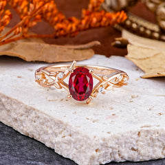 Nature-Inspired Branch-Wrapped 4-Prong Oval Ruby Engagement Rings