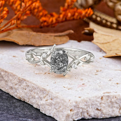 Nature-Inspired Branch-Wrapped 4-Prong Oval Black Rutilated Quartz Engagement Rings