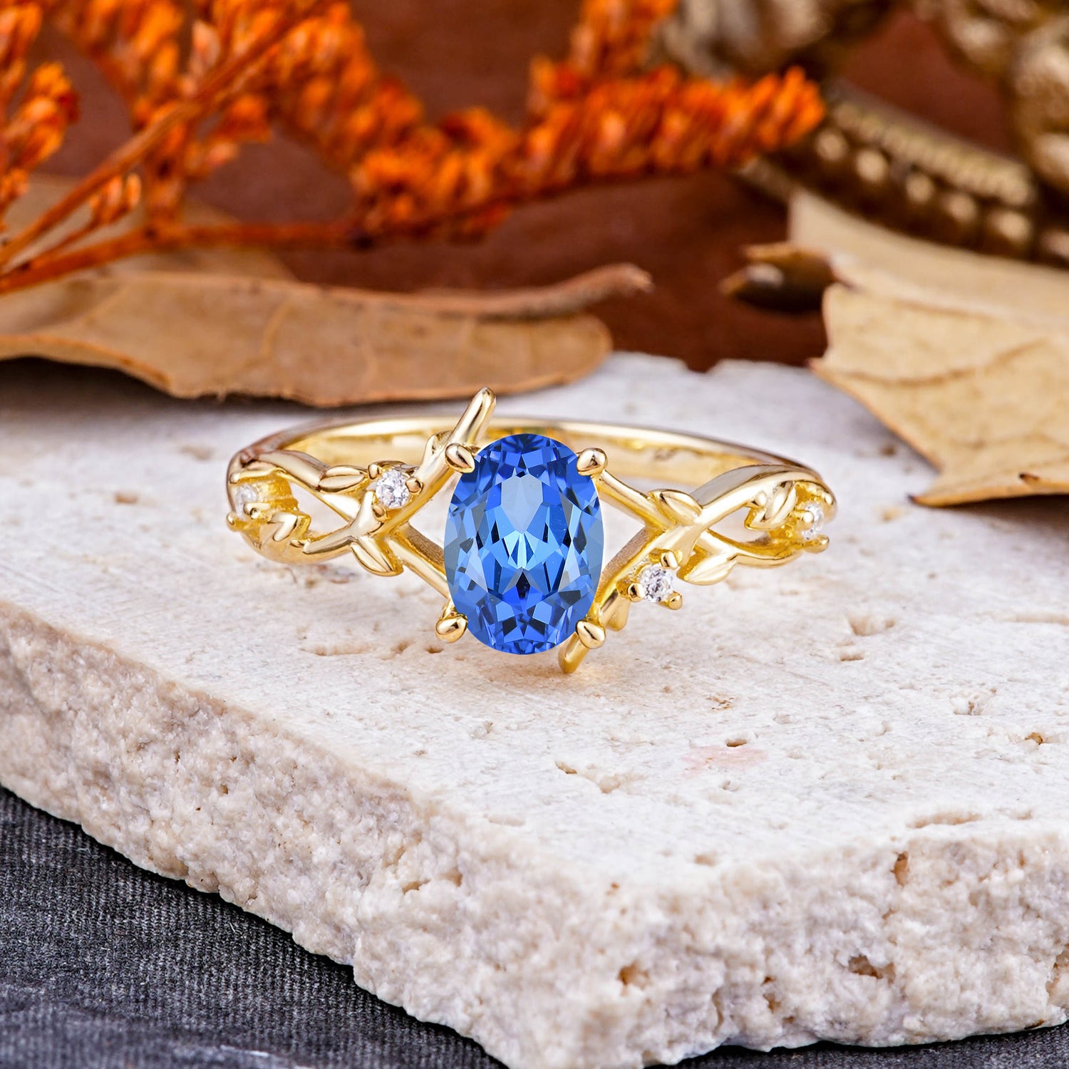 Nature-Inspired Branch-Wrapped 4-Prong Oval Sapphire Engagement Rings