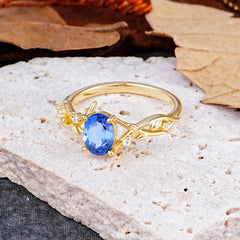 Nature-Inspired Branch-Wrapped 4-Prong Oval Sapphire Engagement Couple Rings