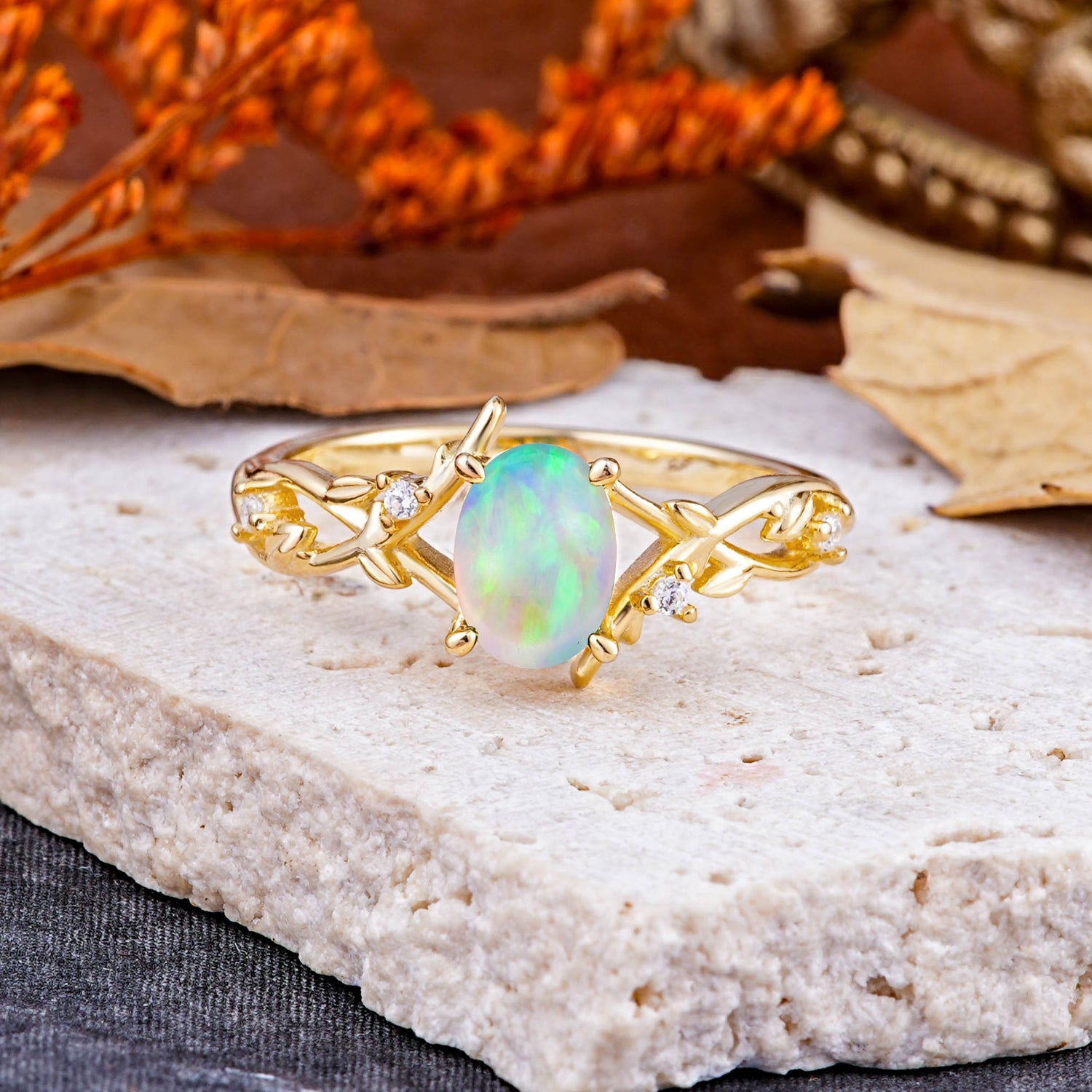 Nature-Inspired Branch-Wrapped 4-Prong Oval Opal Engagement Rings