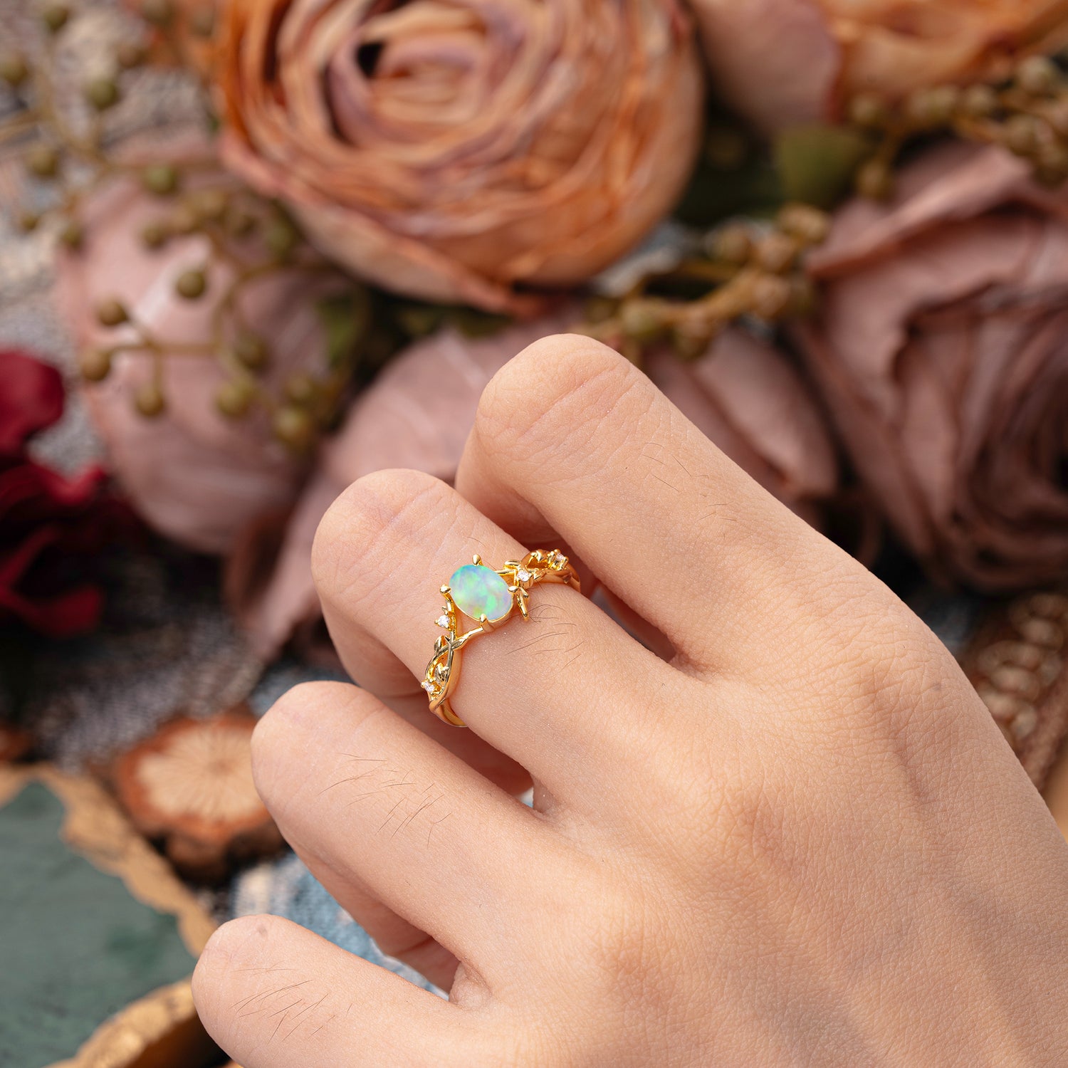 Nature-Inspired Branch-Wrapped 4-Prong Oval Opal Engagement Rings