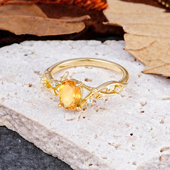 Nature-Inspired Branch-Wrapped 4-Prong Oval Citrine Engagement Rings