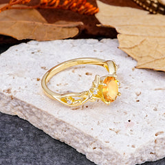 Nature-Inspired Branch-Wrapped 4-Prong Oval Citrine Engagement Rings
