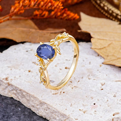 Nature-Inspired Branch-Wrapped 4-Prong Oval Tanzanite Engagement Rings