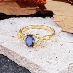 Nature-Inspired Branch-Wrapped 4-Prong Oval Tanzanite Engagement Rings