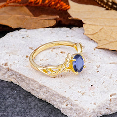 Nature-Inspired Branch-Wrapped 4-Prong Oval Tanzanite Engagement Rings