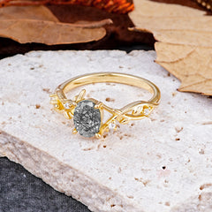Nature-Inspired Branch-Wrapped 4-Prong Oval Black Rutilated Quartz Engagement Rings