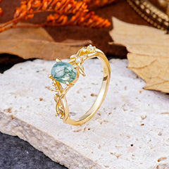 Nature-Inspired Branch-Wrapped 4-Prong Oval Moss Agate Engagement Rings