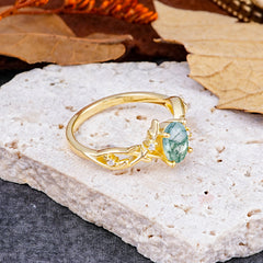 Nature-Inspired Branch-Wrapped 4-Prong Oval Moss Agate Engagement Rings