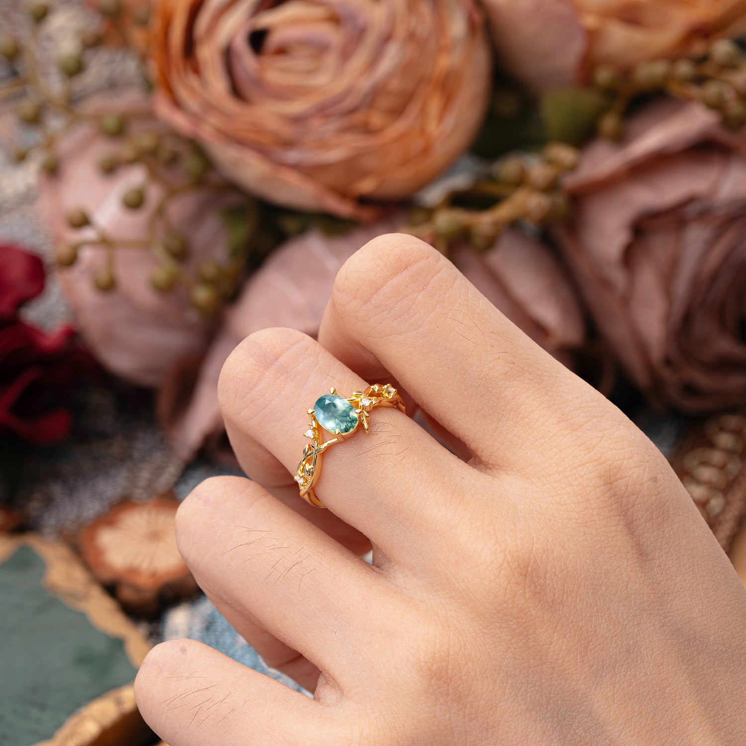 Nature-Inspired Branch-Wrapped 4-Prong Oval Moss Agate Engagement Rings