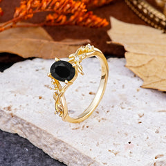 Nature-Inspired Branch-Wrapped 4-Prong Oval Black Onyx Engagement Rings