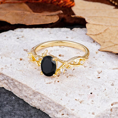 Nature-Inspired Branch-Wrapped 4-Prong Oval Black Onyx Engagement Rings