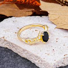 Nature-Inspired Branch-Wrapped 4-Prong Oval Black Onyx Engagement Rings