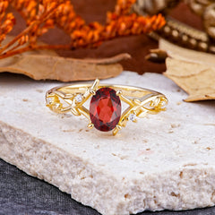 Nature-Inspired Branch-Wrapped 4-Prong Oval Garnet Engagement  Rings