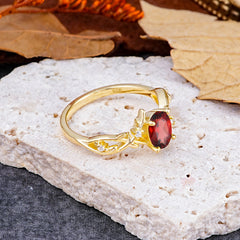 Nature-Inspired Branch-Wrapped 4-Prong Oval Garnet Engagement  Rings