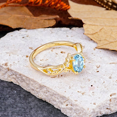 Nature-Inspired Branch-Wrapped 4-Prong Oval Aquamarine Engagement  Rings
