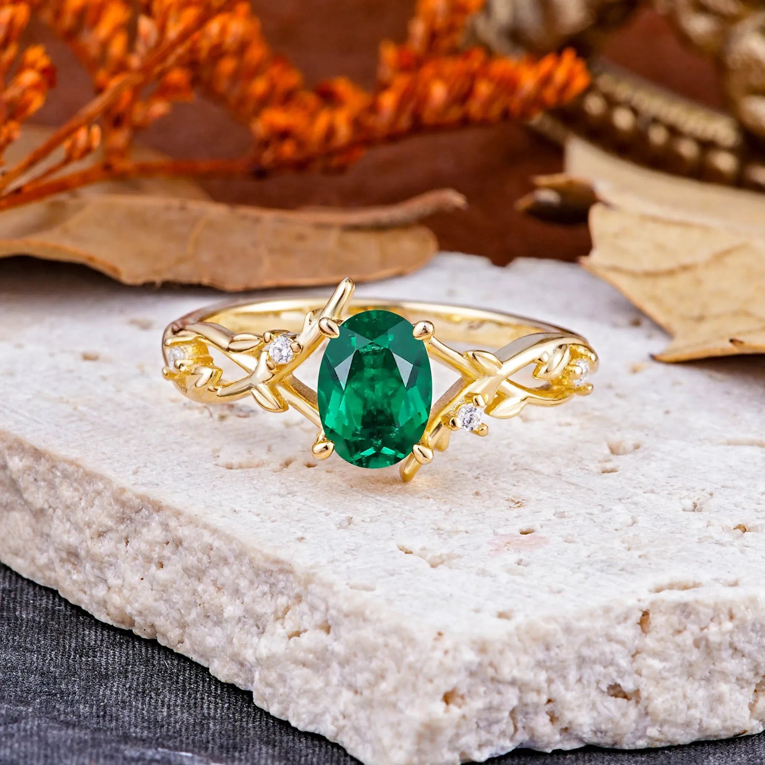 Nature-Inspired Branch-Wrapped 4-Prong Oval Emerald Engagement Rings