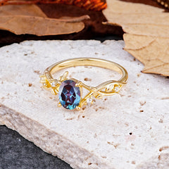 Nature-Inspired Branch-Wrapped 4-Prong Oval Alexandrite Engagement Rings