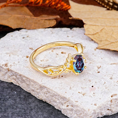 Nature-Inspired Branch-Wrapped 4-Prong Oval Alexandrite Engagement Rings