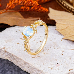 Nature-Inspired Branch-Wrapped 4-Prong Oval Moonstone Engagement  Rings