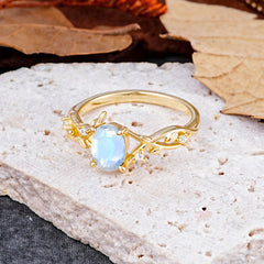 Nature-Inspired Branch-Wrapped 4-Prong Oval Moonstone Engagement  Rings