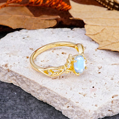 Nature-Inspired Branch-Wrapped 4-Prong Oval Moonstone Engagement  Rings
