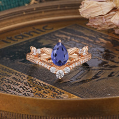 Nature-Inspired Pear-Cut Natural Tanzanite Couple's Engagement Ring Set