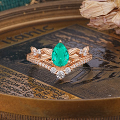 Nature-Inspired Pear-Cut Emerald Couple's Engagement Ring Set