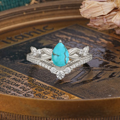 Nature-Inspired Pear-Cut Turquoise Couple's Engagement Ring Set