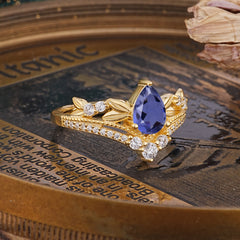 Nature-Inspired Pear-Cut Natural Tanzanite Couple's Engagement Ring Set